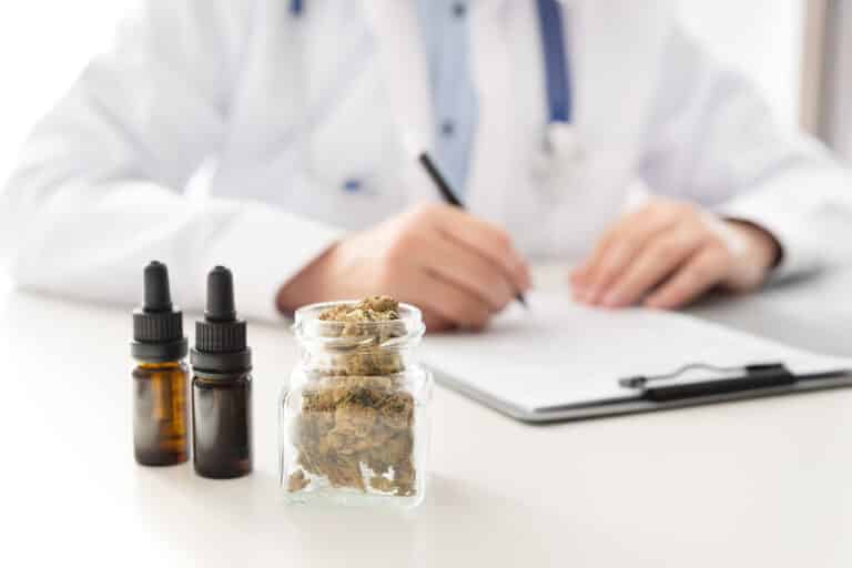 Doctor with cannabis hemp and oil. Medical clinic with modern neurological treatment